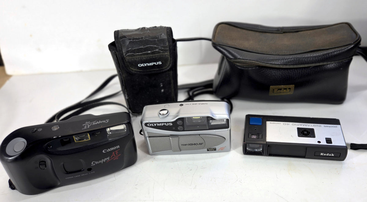 Vintage Film Camera Lot of 3 – Canon, Olympus & Kodak – Untested